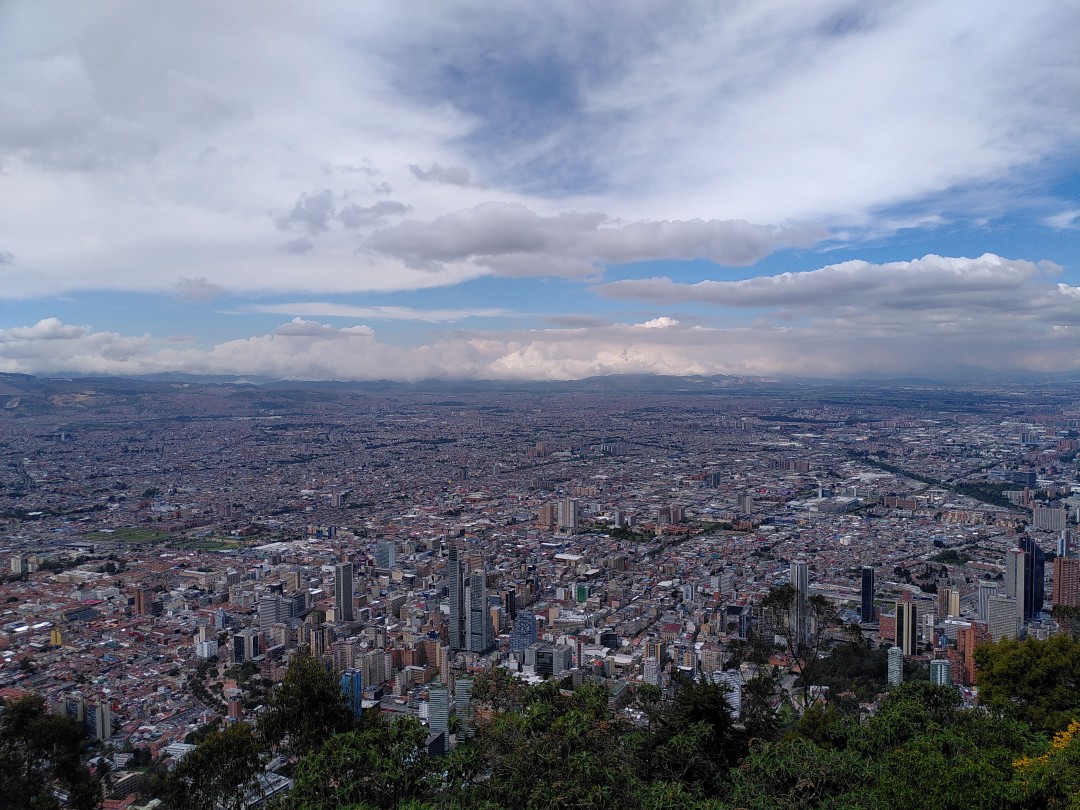 Panorama of an enormous city seen from a nearby mountain