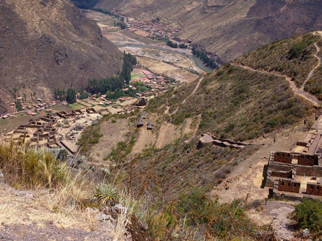 Another top view of a mountain flank with Inka buildings over a deep valley