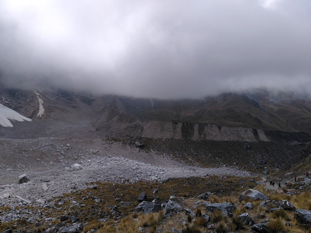 A huge, ice-free ridge of rocks and rubble between mountains where a glacier used to be